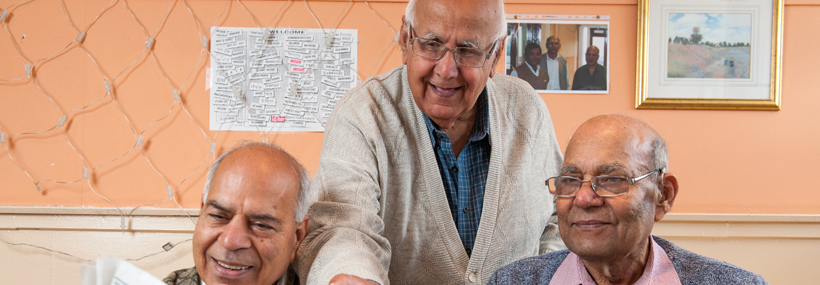 Image of older men looking at a document